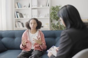 a teen sees her mental health improve since beginning cognitive behavioral therapy