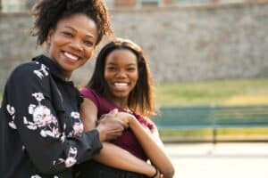 mother and daughter smiling while choosing the right treatment program